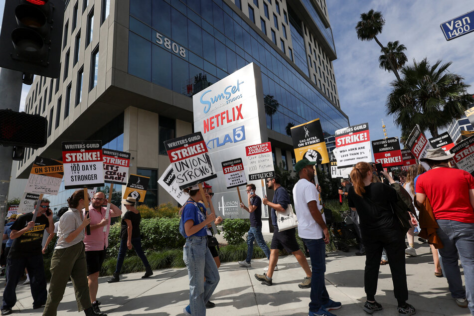 Striking Hollywood writers meet with studio execs amid hopes of resolution