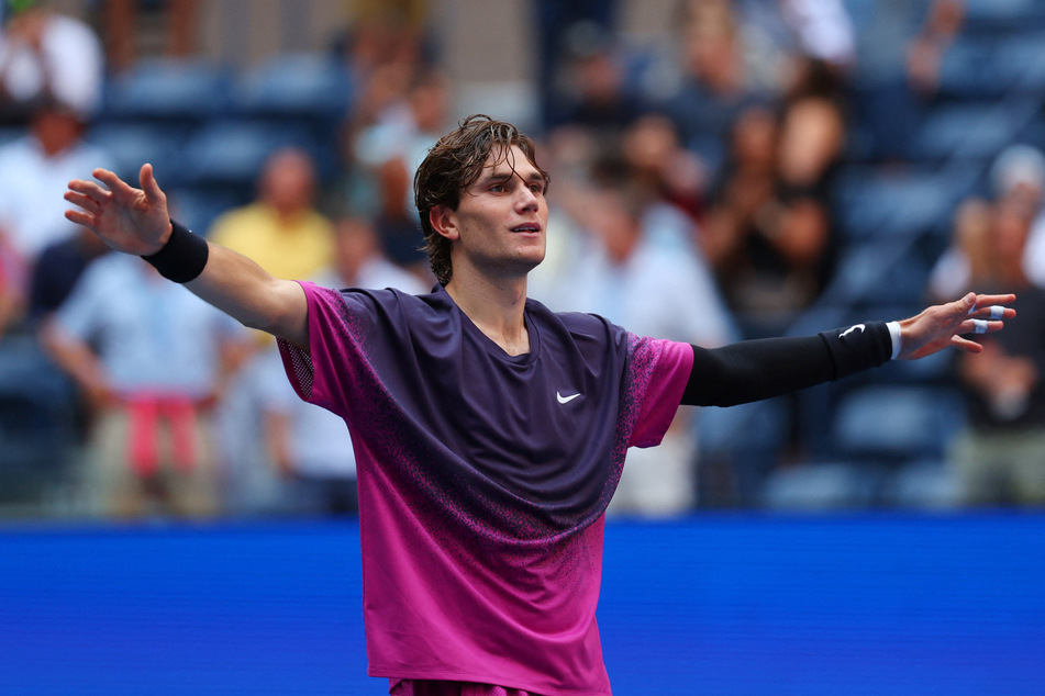 Jack Draper of the UK reacts after winning his quarterfinal match against Australia's Alex De Minaur at the 2024 US Open.