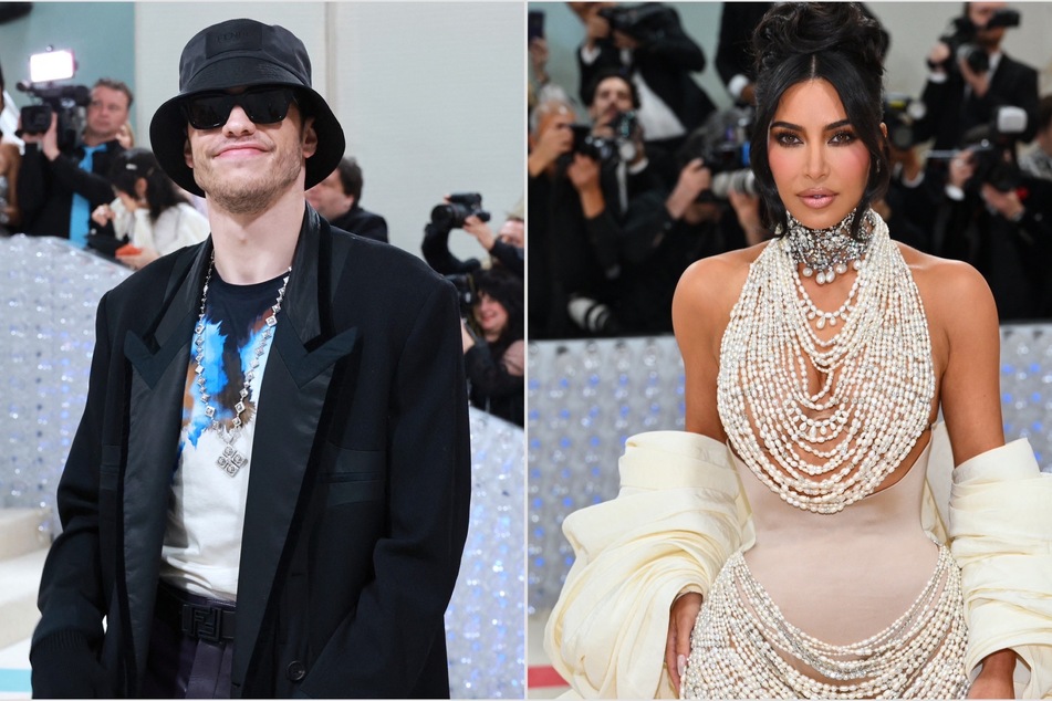 Awkward? Kim Kardashian (r) and Pete Davidson were seen having a chat at this year's Met Gala.