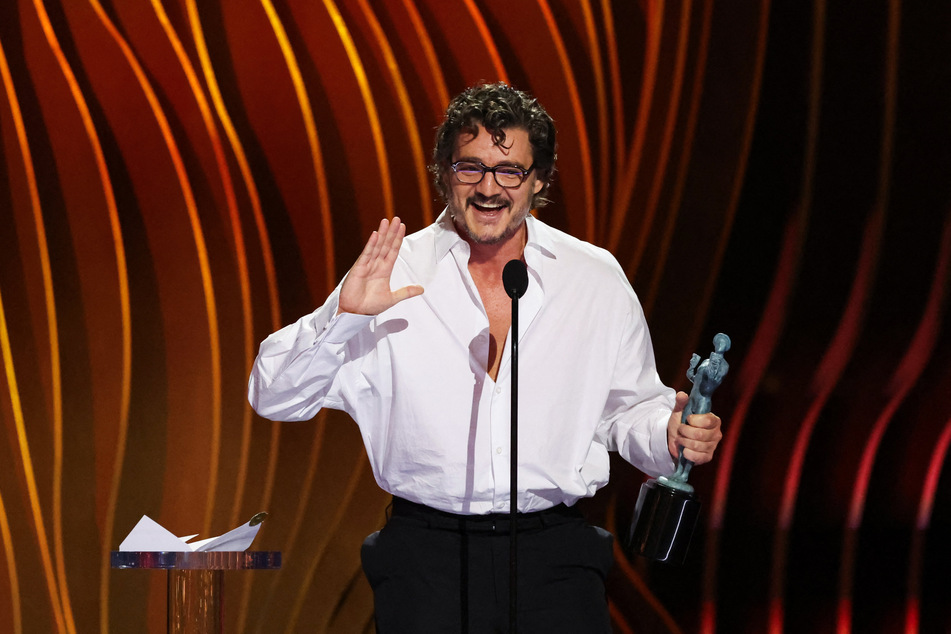 Pedro Pascal receives the award for Male Actor in a Drama Series for The Last of Us at the 30th Screen Actors Guild Awards.