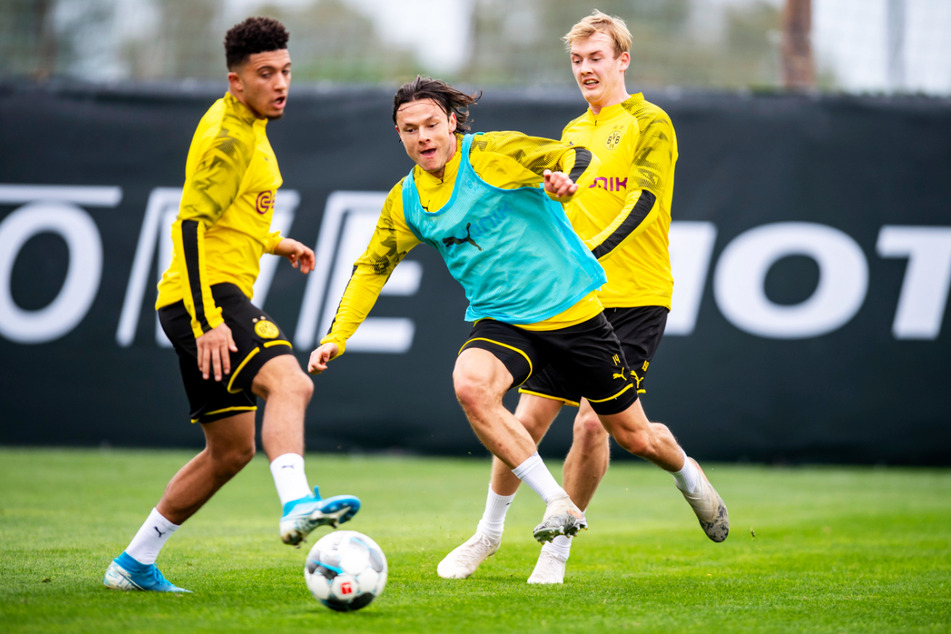 BVB-Star Jadon Sancho (20, l.) wird weiterhin von Manchester United umworben. Nico Schulz (28, M.) und Julian Brandt (25) stehen in Dortmund hingegen auf der Streichliste. Daher könnten sie alle den Verein in diesem Sommer verlassen.