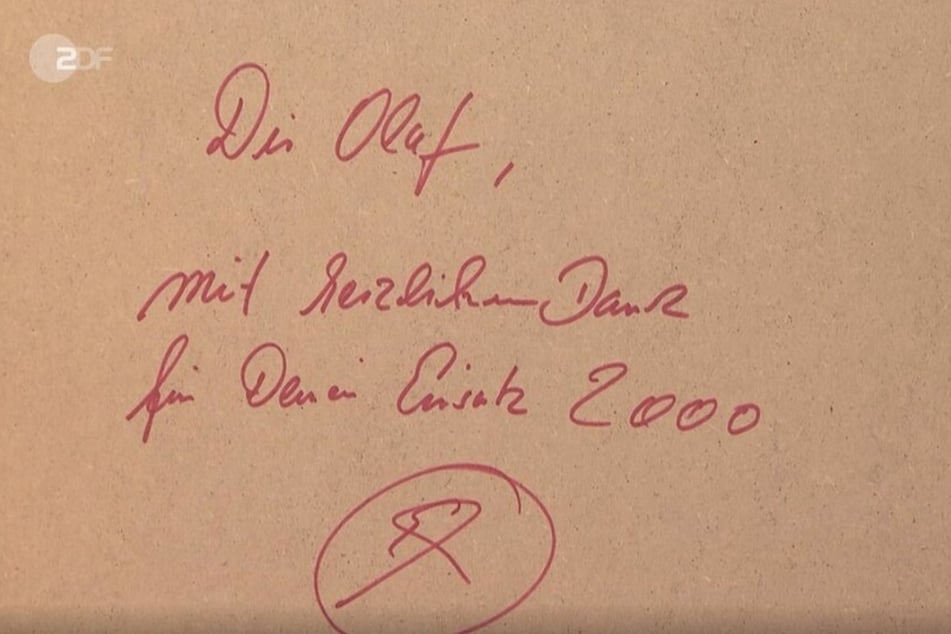 Diese Widmung für Olaf sorgt dafür, dass das Kunstwerk so wertvoll ist.