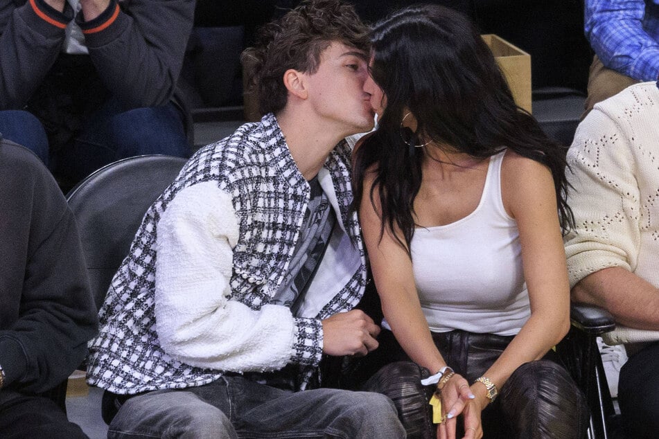 Kylie Jenner and Timothée Chalamet (l.) were seated courtside for another PDA-filled date night.