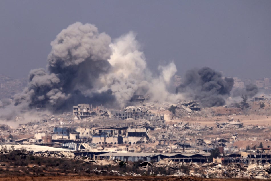 Thick smoke billows during Israeli strikes on the besieged Palestinian territory of Gaza on July 27, 2025.