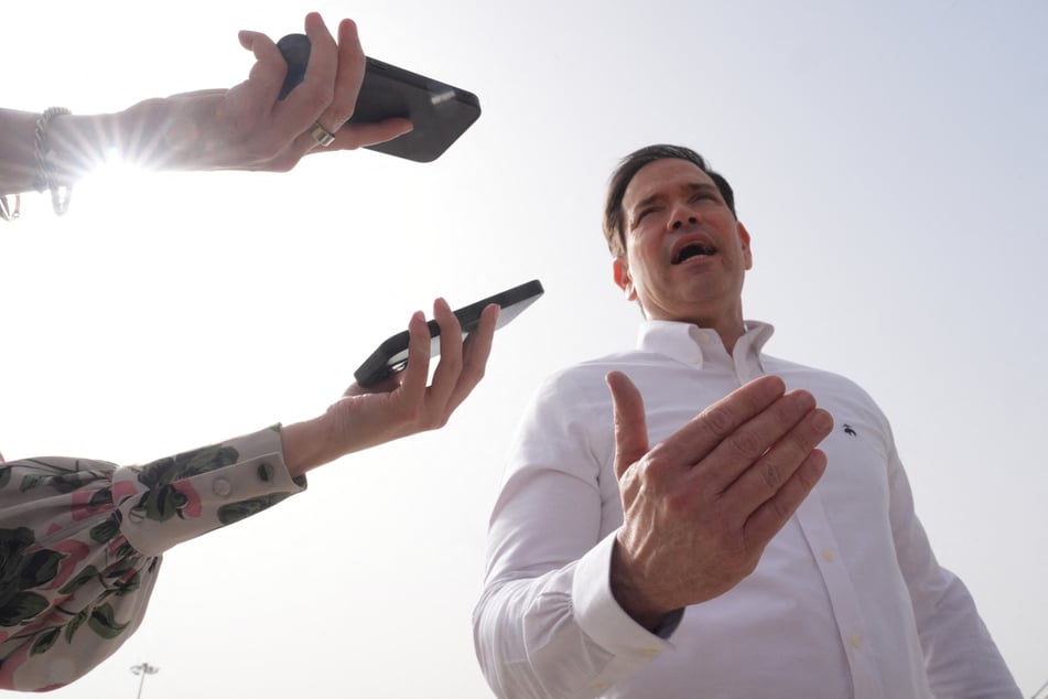 Secretary of State Marco Rubio speaks to journalists before boarding his plane at Indira Gandhi International Airport in New Delhi on May 25, 2026.