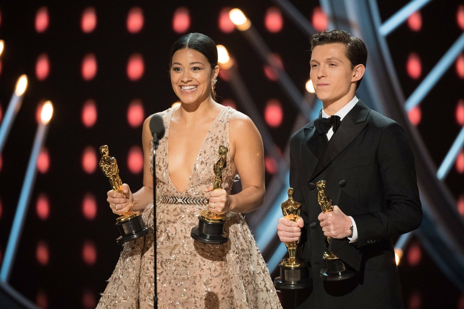 Gina Rodriguez and Tom Holland at the 2018 Oscars.