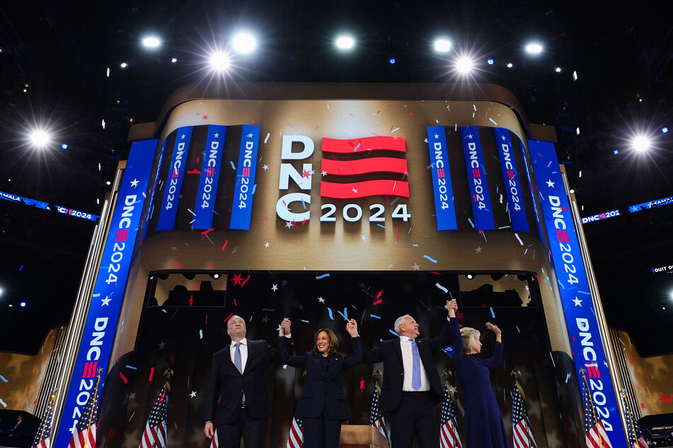 Harris and her running mate, Minnesota Governor Tim Walz (2nd from r.) soaked up the adulation from the crowd.