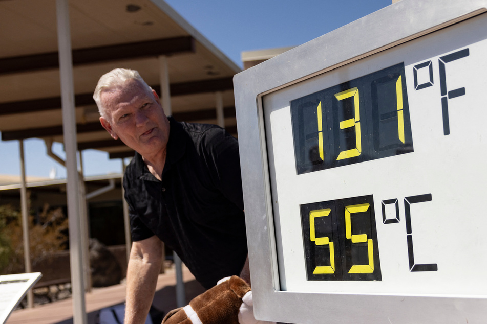 Last month was the hottest July on record, making it the fourteenth straight record-breaking month, a US environmental agency reported Monday.