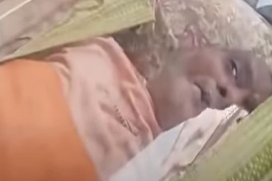 This man lay in his "coffin" for 24 hours before being freed.