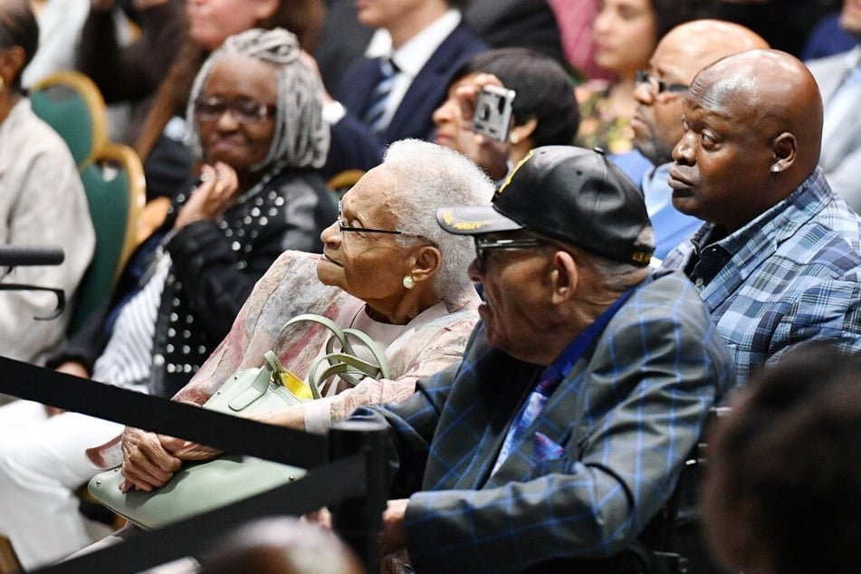 Tulsa race massacre Survivors Viola Fletcher (c.) and Hughes Van Ellis (r.) listen as President Joe Biden speaks on the 100th anniversary of the 1921 Tulsa Race Massacre.