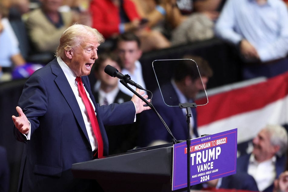 Donald Trump gestures during his speech at a campaign rally in Grand Rapids, Michigan.