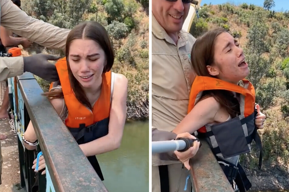 Filled with fear, the young woman clings to the railing to avoid having to jump into the depths.