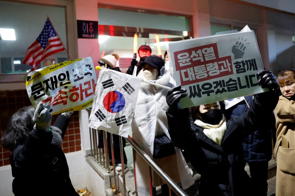 Supporters of South Korea's impeached President Yoon Suk Yeol participate in a rally outside the Seoul Detention Center in Uiwang, South Korea.