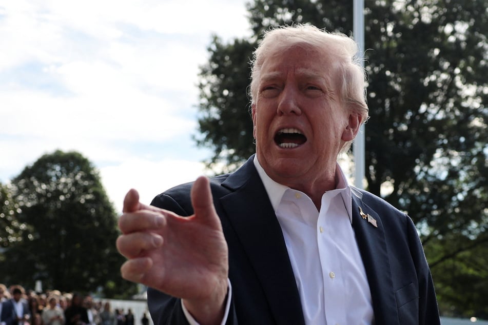 President Donald Trump hinted that more of his political enemies will be targeted in the wake of ex-FBI director James Comey's indictment.