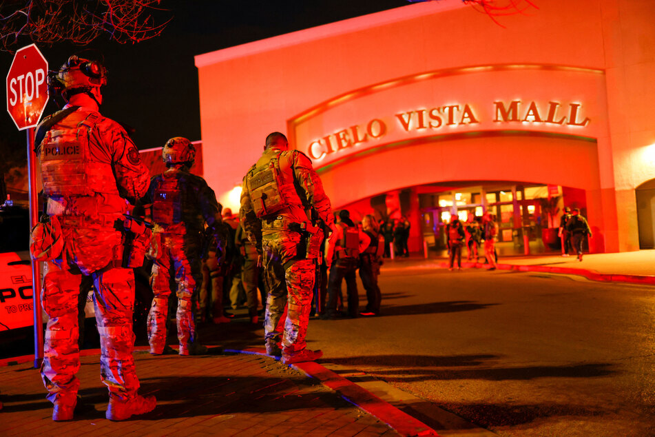 Police gather outside the Cielo Vista mall in El Paso, Texas, where a shooting took place on Wednesday.