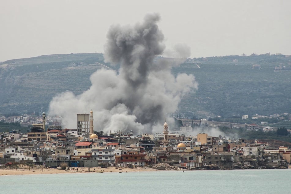 Smoke rises from the site of an Israeli airstrike that targeted the area of Ras Al-Ain, Lebanon, on May 12, 2026.