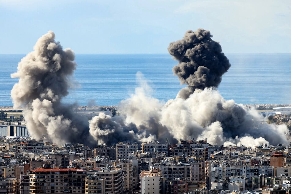 Israel continued to bombard Beirut on Tuesday amid the talk of a ceasefire deal.