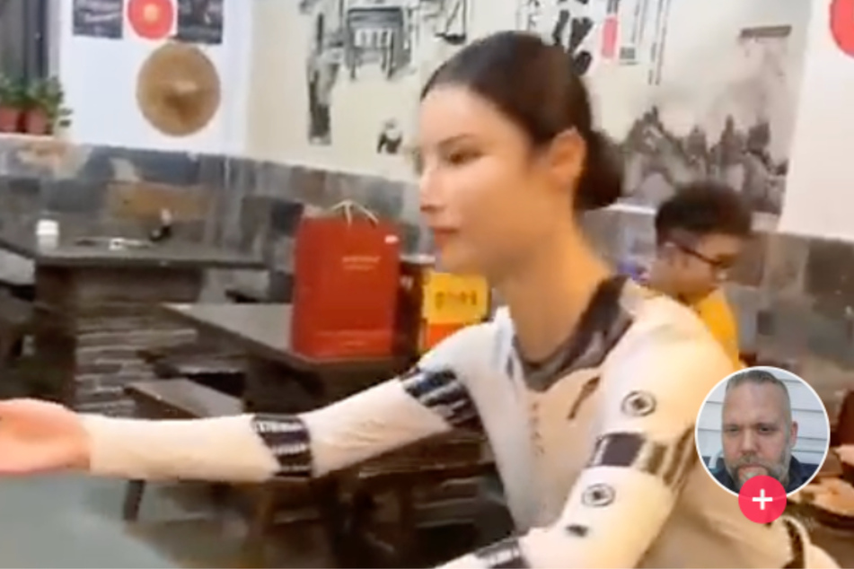 Die Bewegungen und die Art und Weise, wie diese Kellnerin serviert, erinnern sehr stark an einen Roboter.