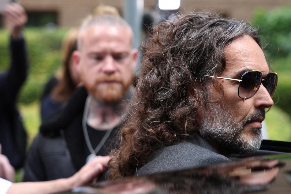 Comedian Russell Brand appears in court to face new rape charges