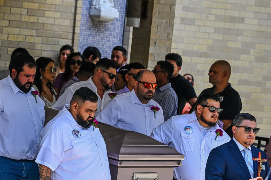 Pallbearers carried the casket of 10-year-old Amerie Jo Garza, who died in the mass shooting at Robb Elementary School, during her funeral mass at Sacred Heart Catholic Church in Uvalde, Texas, on Tuesday.