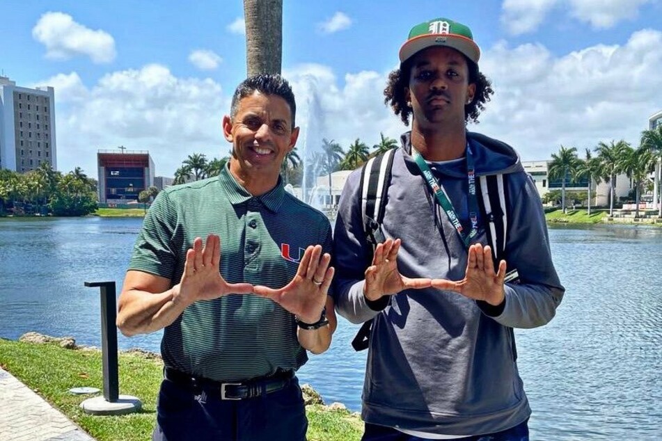 University of Miami quarterback coach Frank Ponce (l) and Jaden Rashada.