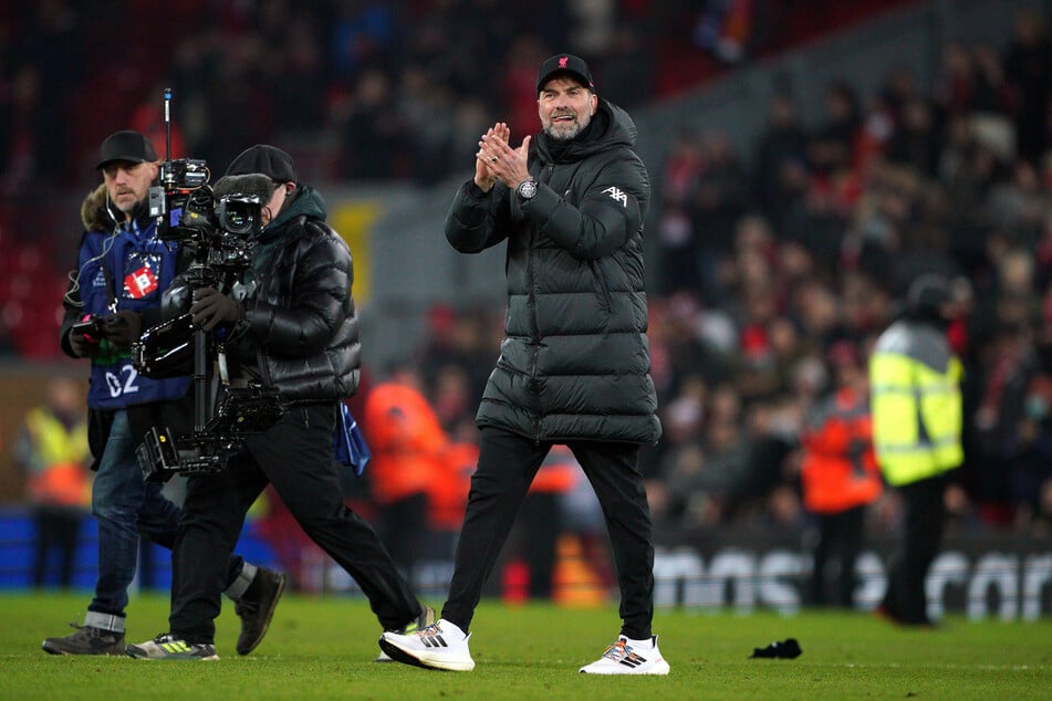Jürgen Klopp applauding the Liverpool supporters after full time.