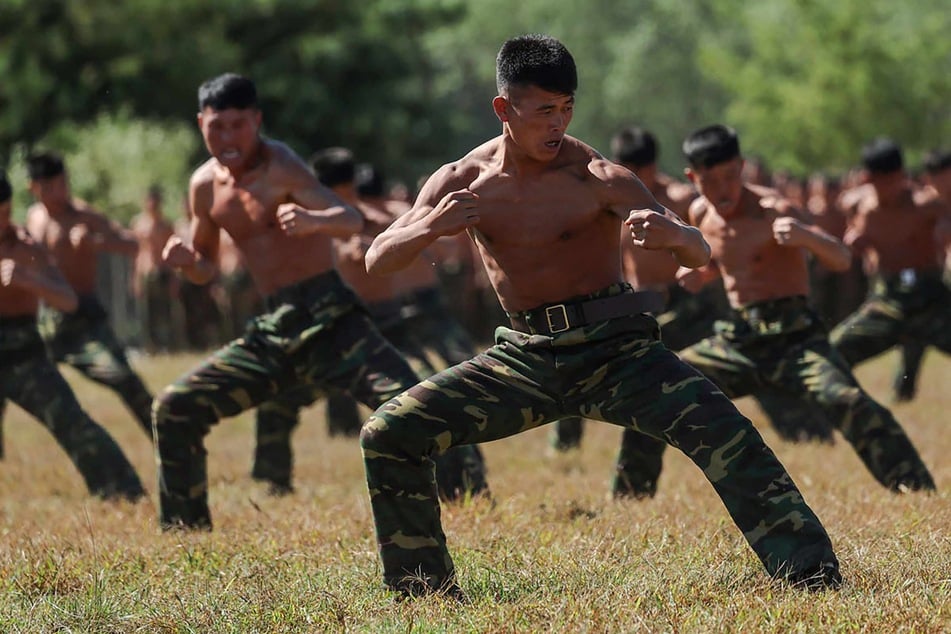 This picture taken on October 2, 2024 and released from North Korea's official Korean Central News Agency (KCNA) via KNS on October 4, 2024 shows troops taking part in training at a base of the Korean People's Army's special operations forces in the western region, at an undisclosed location in North Korea.