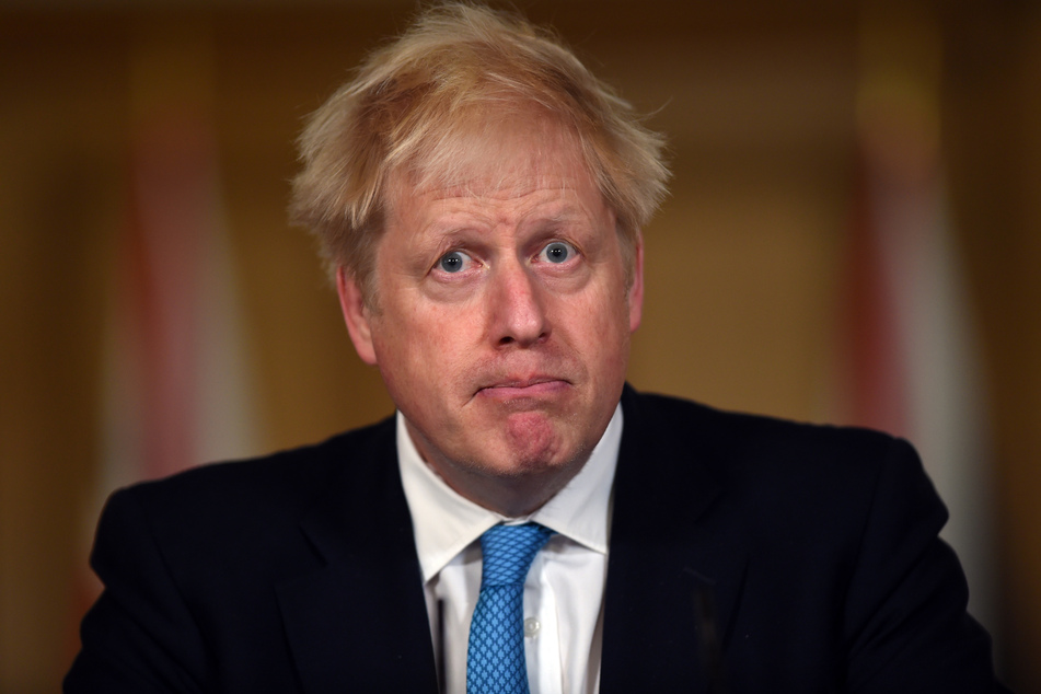 Boris Johnson, Premierminister von Großbritannien, bei einer Pressekonferenz. Das Coronavirus hat England stark getroffen.