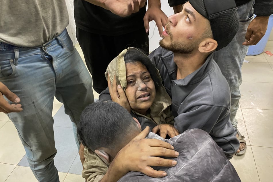 Palestinians who were injured in Israeli strikes on displacement tents in Khan Younis are pictured after they arrive at the Nasser hospital in the southern Gaza Strip on June 3, 2025.