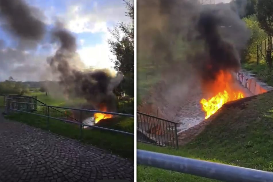 Flammen loderten aus dem brennenden Abwasserschacht.
