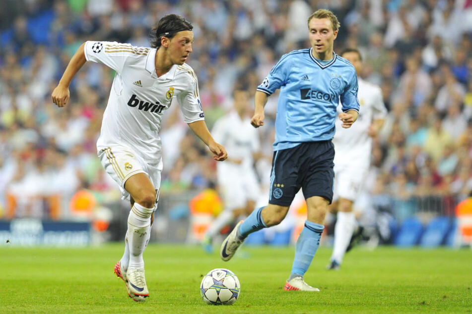 Real gegen Ajax: Christian Eriksen (r.) spielte mehrfach gegen den deutschen Weltmeister von 2014, Mesut Özil (l.).