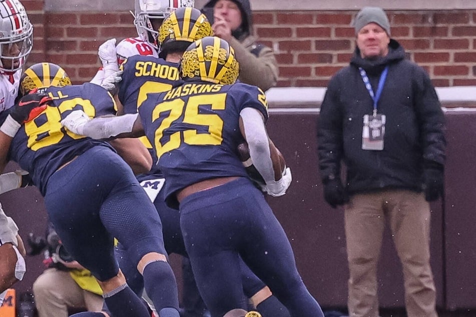 Wolverines running back Hassan Haskins (c) scored five touchdowns against the Buckeyes on Saturday.