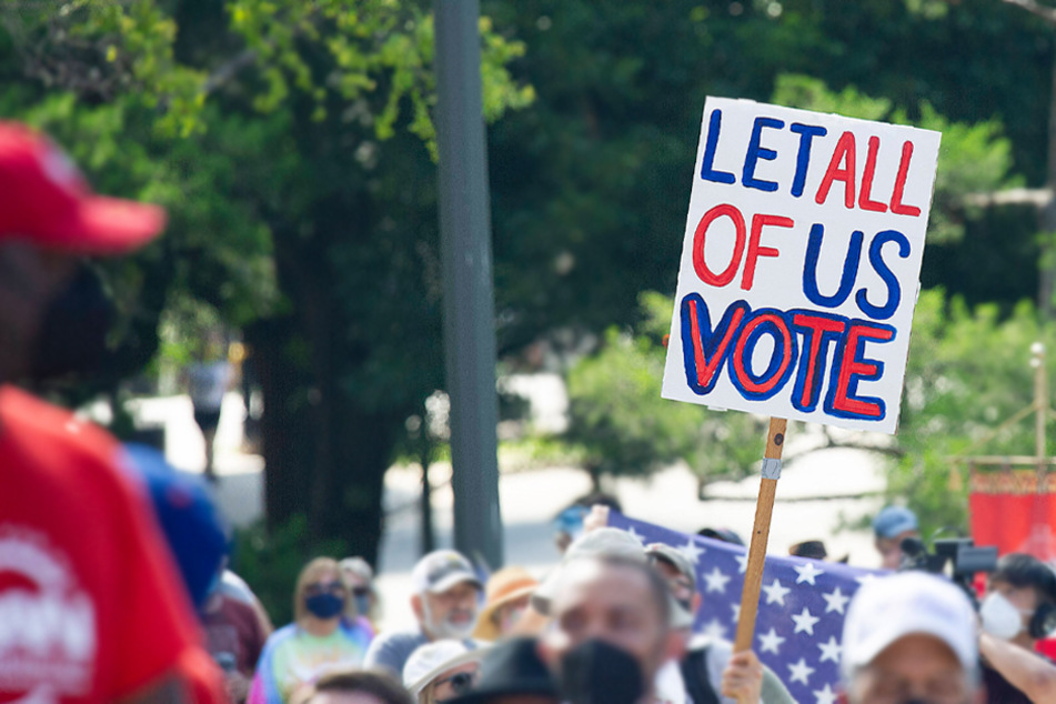 Voting rights protestors march to the Texas State Capital on July 31 in Austin, Texas.