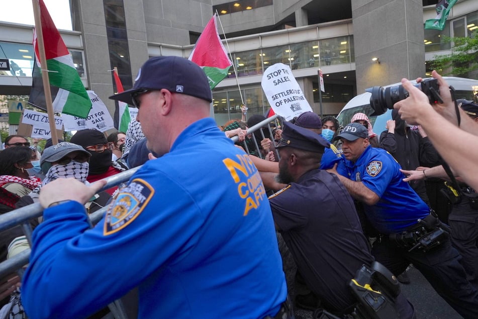 NYPD officers respond to the Stop the Sale of Stolen Palestinian Land protest against the Great Israeli Real Estate Event at the Park East Synagogue in Manhattan on May 5, 2026.