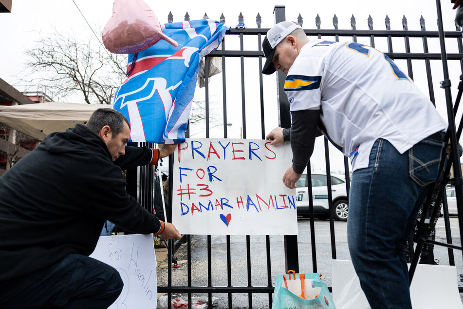 Fans and well-wishers showed their support for Damar Hamlin outside the University of Cincinnati Medical Center, where he is still hospitalized.