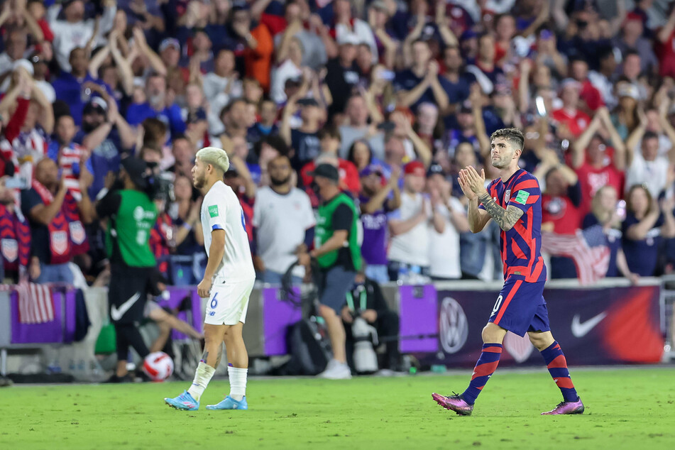 Christian Pulisic applauds the crowd as he comes off the pitch after scoring a hat-trick against Panama.