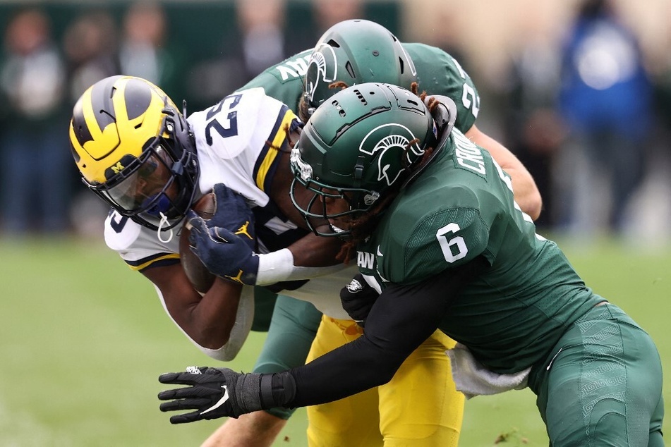 The Big Ten Conference has informed the Michigan State and upcoming opponents of the Wolverines of Michigan's alleged cheating.