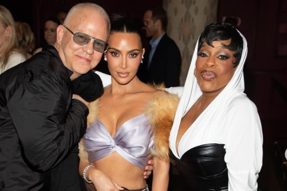 Kim Kardashian (c.) shared images from the premiere of All's Fair amid negative reviews from critics.