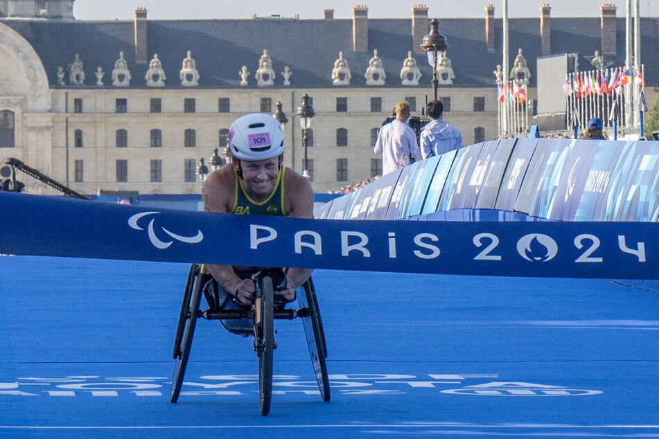 Australia's Lauren Parker wins the Para Triathlon women's PTWC3 event during the Paris 2024 Paralympic Games on September 2, 2024.
