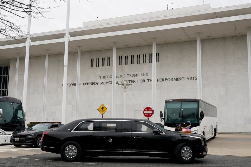 The limousine of President Donald Trump, also known as "The Beast," drives in front of the Kennedy Center, renamed the Trump-Kennedy Center by the Trump-appointed board of directors, on January 6, 2026.