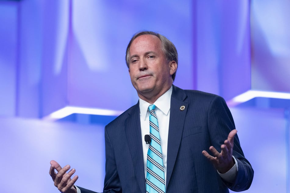 Four former employees have filed suit against Texas Attorney General Ken Paxton (57).