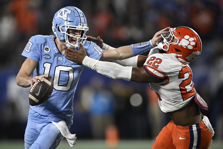 Drake Maye (l.) will return to the college football field this season and fans can expect more exciting plays from the young touted passer.