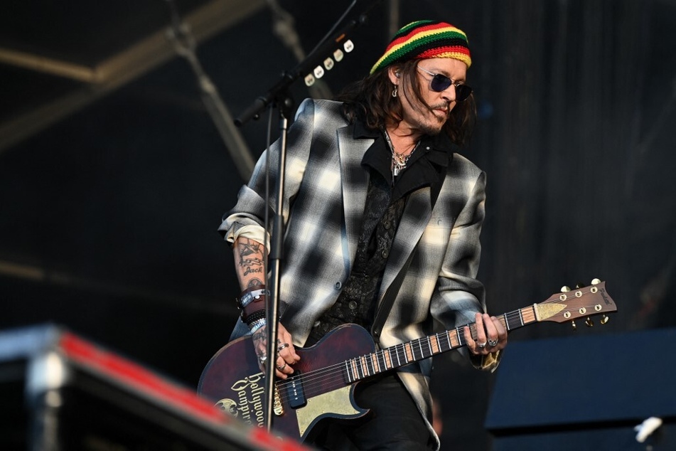Actor and musician Johnny Depp performs with his band, The Hollywood Vampires.
