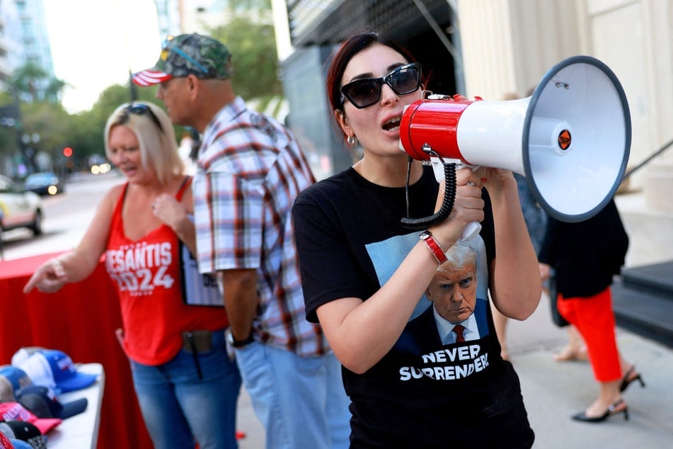 Laura Loomer shows her support for Donald Trump outside a campaign event for Florida Gov. Ron DeSantis at The Vault on October 5, 2023, in Tampa, Florida.