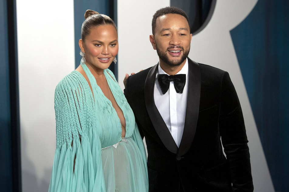 Chrissy Teigen and John Legend at the Vanity Fair Oscar Party 2020.