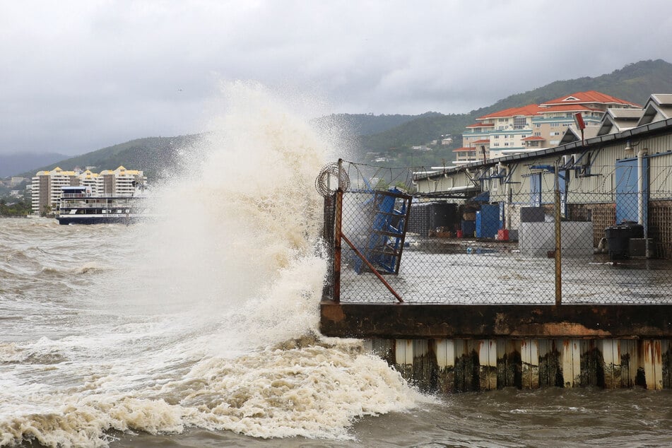 Waves crash into a sea wall after Hurricane Beryl makes landfall in Port of Spain, Trinidad and Tobago.