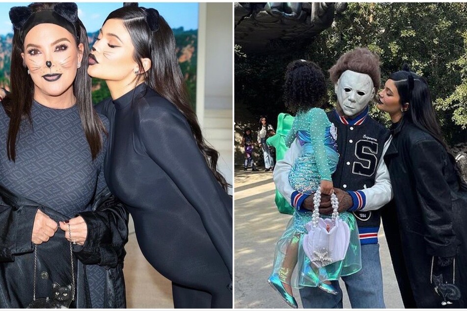 Kylie Jenner (r.) said she was in "full mommy mode" this year as she sported a stylish cat-like attire that matched her mom Kris Jenner (l). She trick or treated with partner Travis Scott (center r.), who wore a Michael Myers mask.