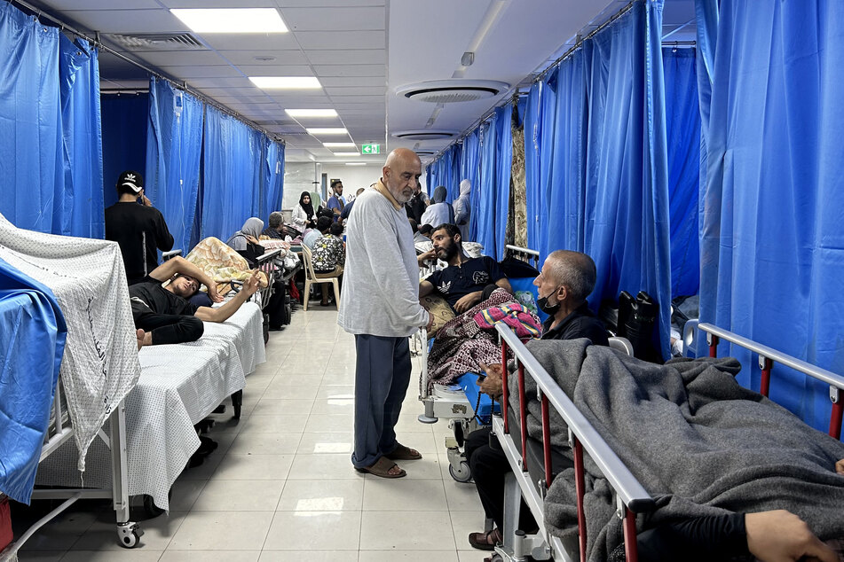 Patients and displaced people at the Al-Shifa hospital in Gaza City on Friday.