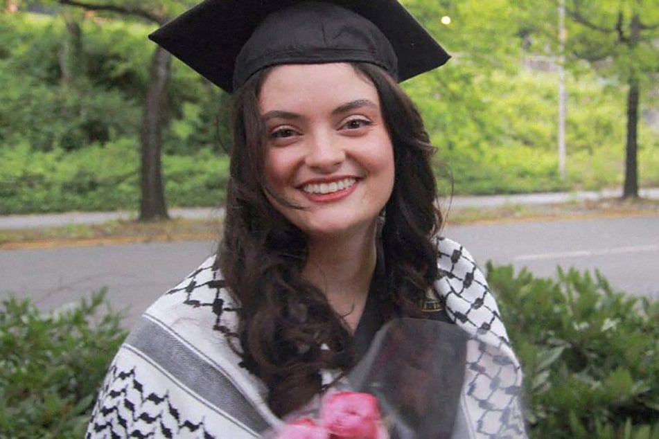 International Solidarity Movement activist Aysenur Ezgi Eygi is pictured wearing a keffiyeh in a family photograph taken at the University of Washington's 2024 commencement ceremony.