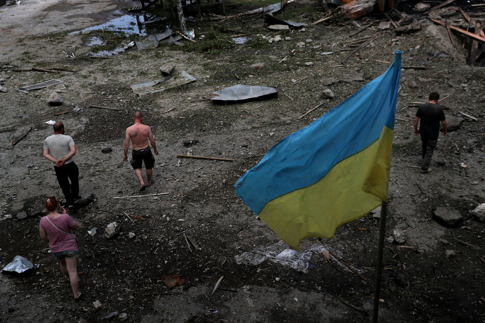 The aftermath of a strike amid Russia's attack on Ukraine, in the outskirts of Kharkiv.